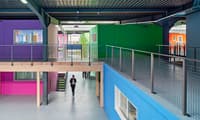 Des modules en bois dans un entrepôt par l'atelier d'architecture Lutz Associés à Fribourg - Image 5