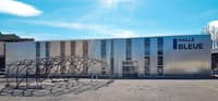 Des modules en bois dans un entrepôt par l'atelier d'architecture Lutz Associés à Fribourg - Image 2